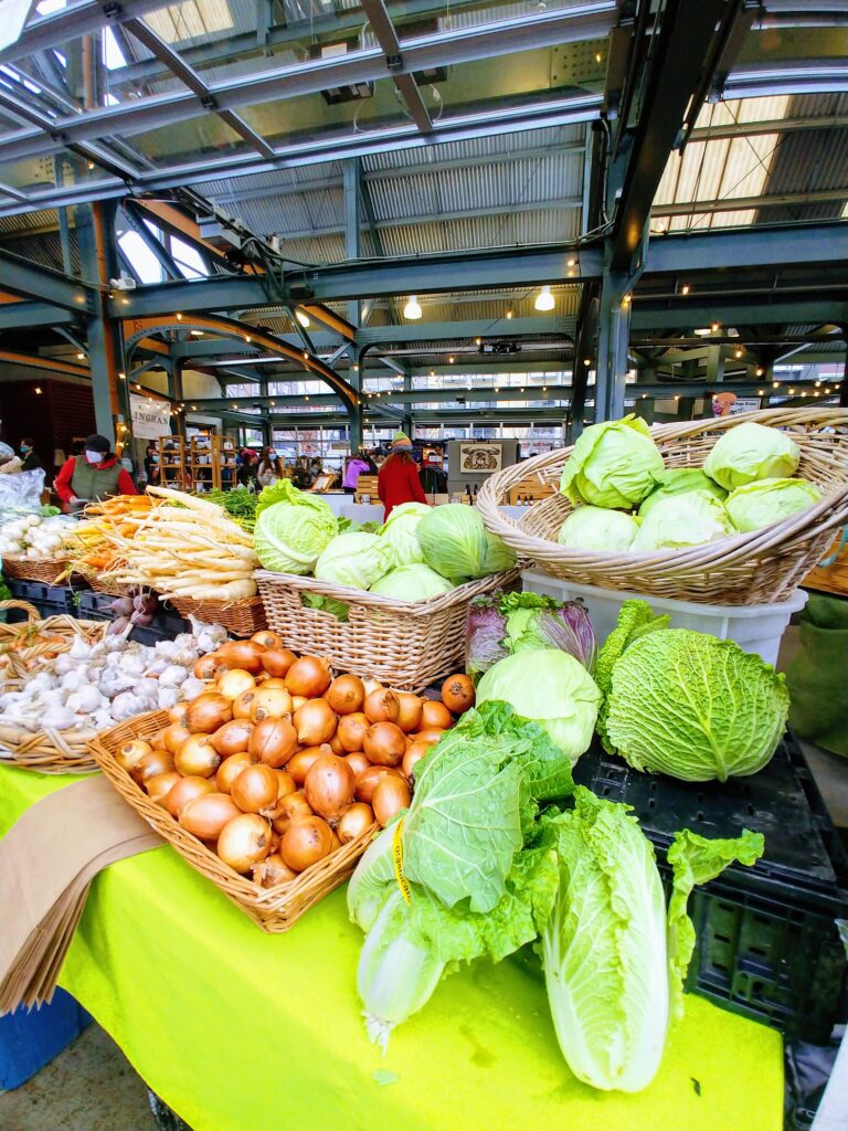 Local produce spread on a vendor table.