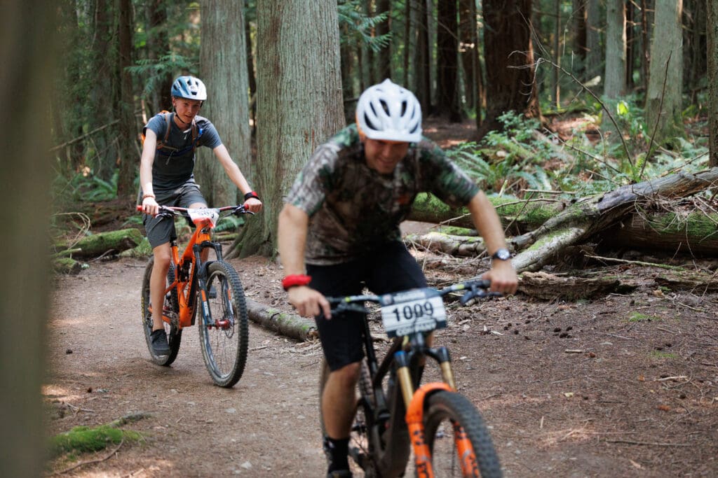 A rider tries to catch up with another mountain biker along the horse trails at Lake Padden.