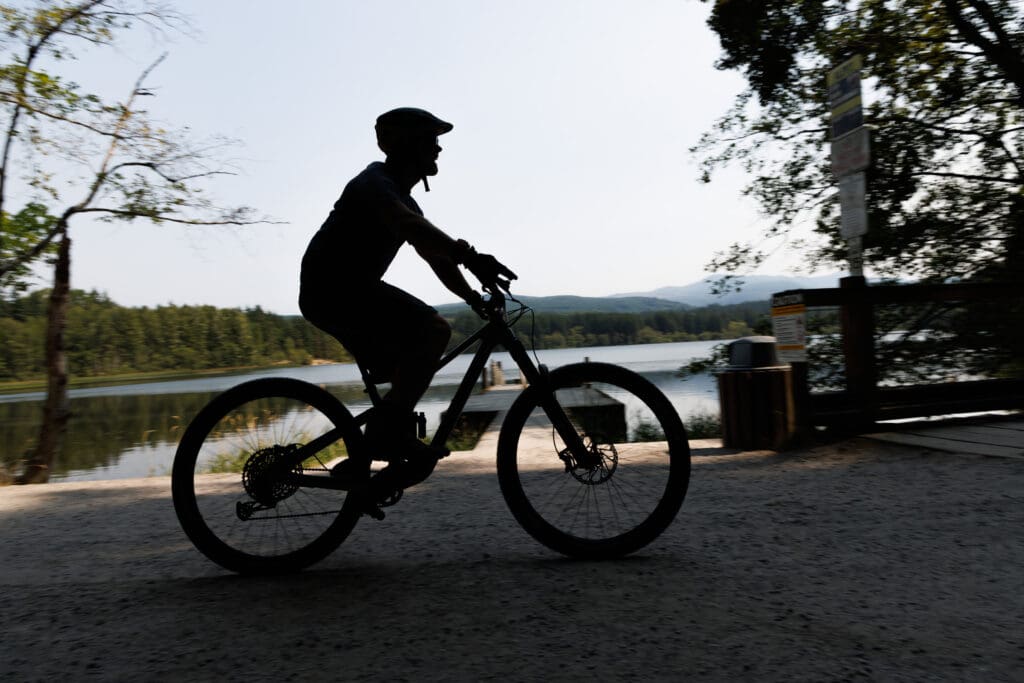 A mountain biker heads up the trail at Lake Padden.