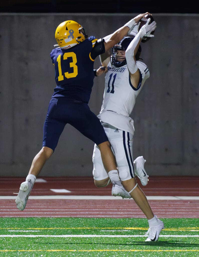 Ferndale’s Bishop Ootsey leaps in the air to break the pass of Glacier Peak.