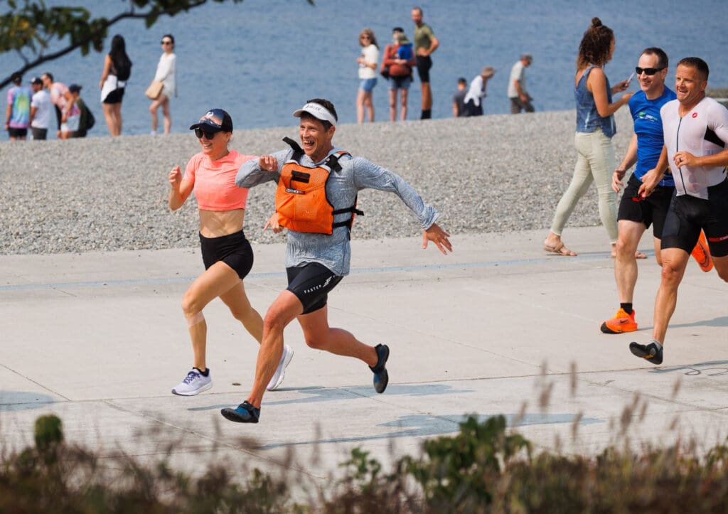 Two teammates race hard for the finish line at Waypoint Park.