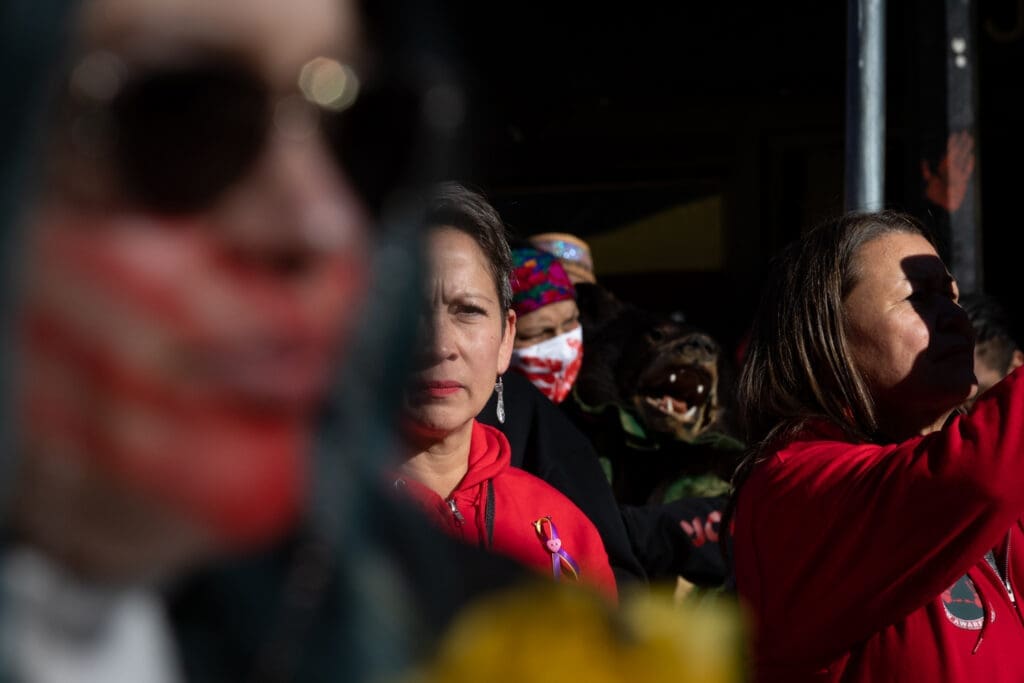 Melanie Mark, the first First Nations woman Member of the Legislative Assembly (MLA) in British Columbia, marches alongside hundreds of others.