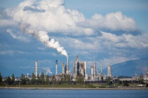 The Anacortes Marathon Refinery has smoke bellowing into the sky.