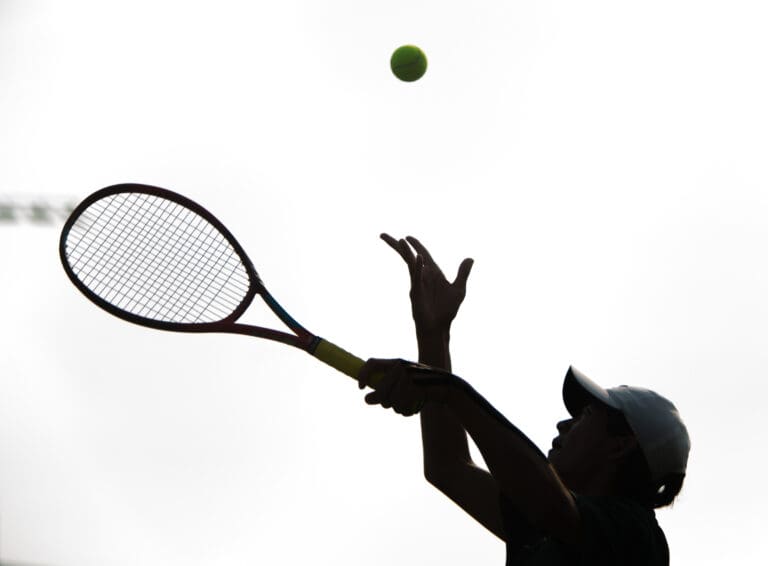 Sehome's Zach Chai serves the ball.