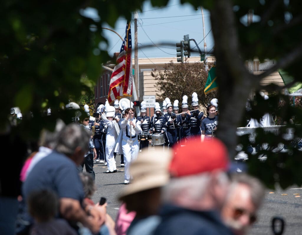 The Squalicum High School marching band makes its way down Cornwall Avenue.