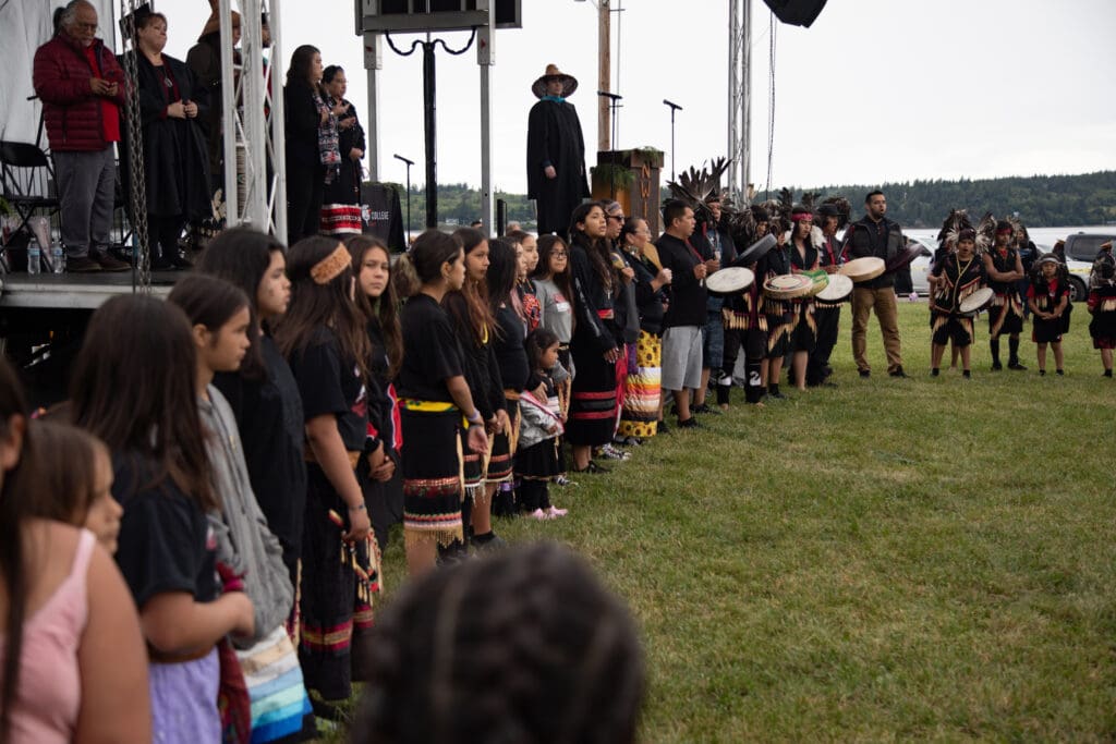 The Lummi Blackhawk Singers opened the graduation ceremony with a song and led the graduates to their seats.