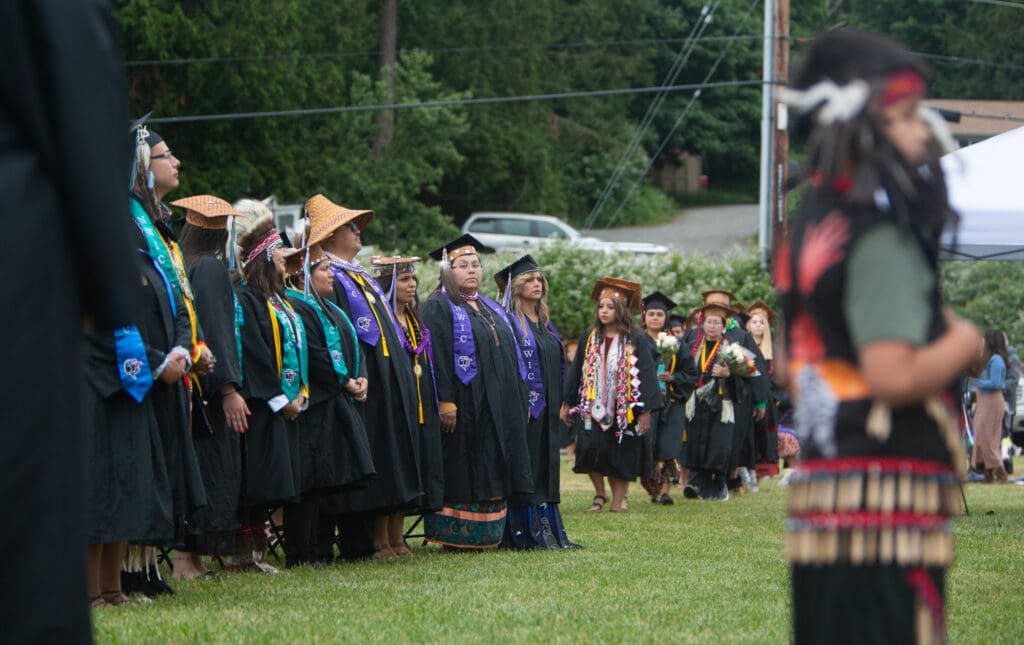 Graduates file into the ceremony.