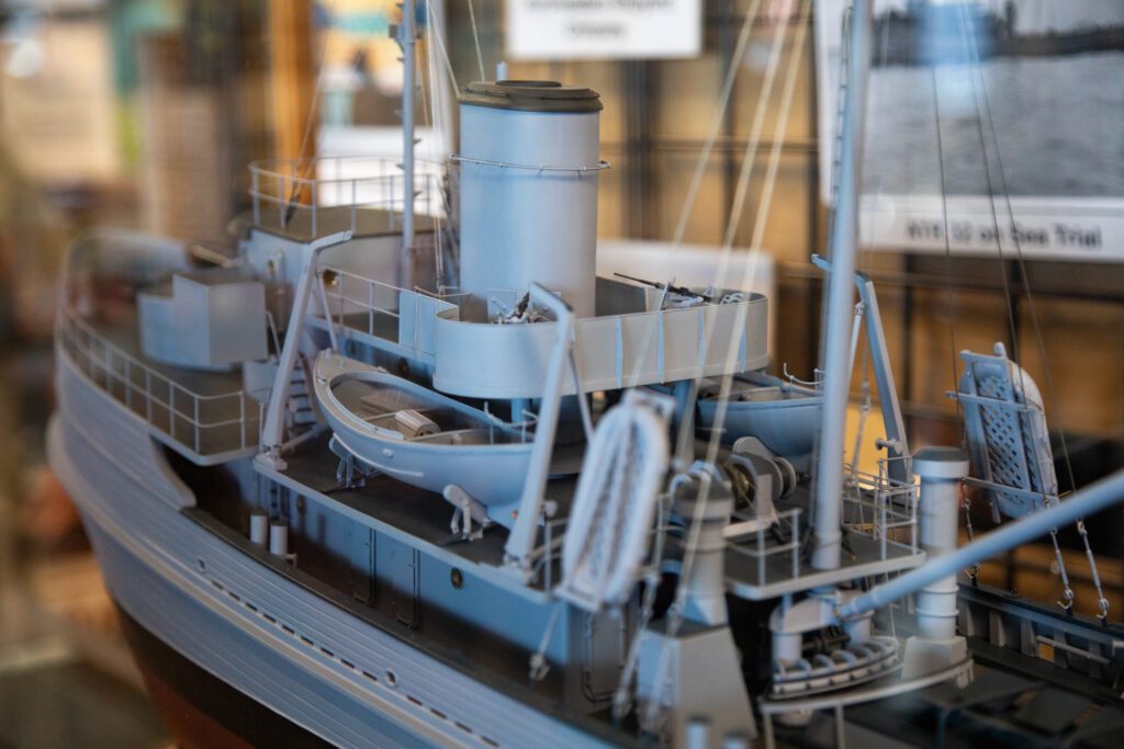 The ATR-32 model scaled down is showcased inside a glass box.