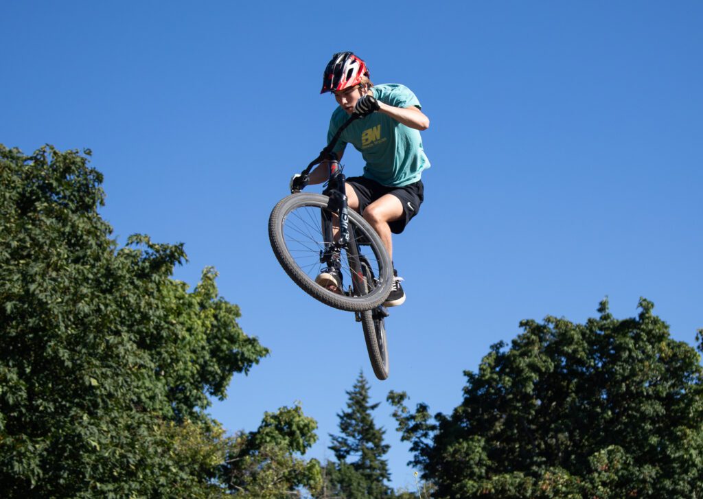 Austin Perillo, 15, soars into the air as he makes trick shots mid-air.