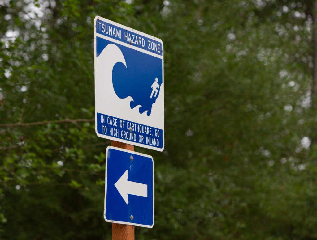 A tsunami hazard zone sign warns visitors in case of an earthquake.