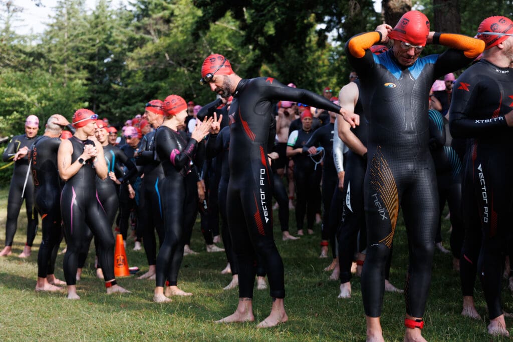 A swimmer stretches before the Padden Triathlon.