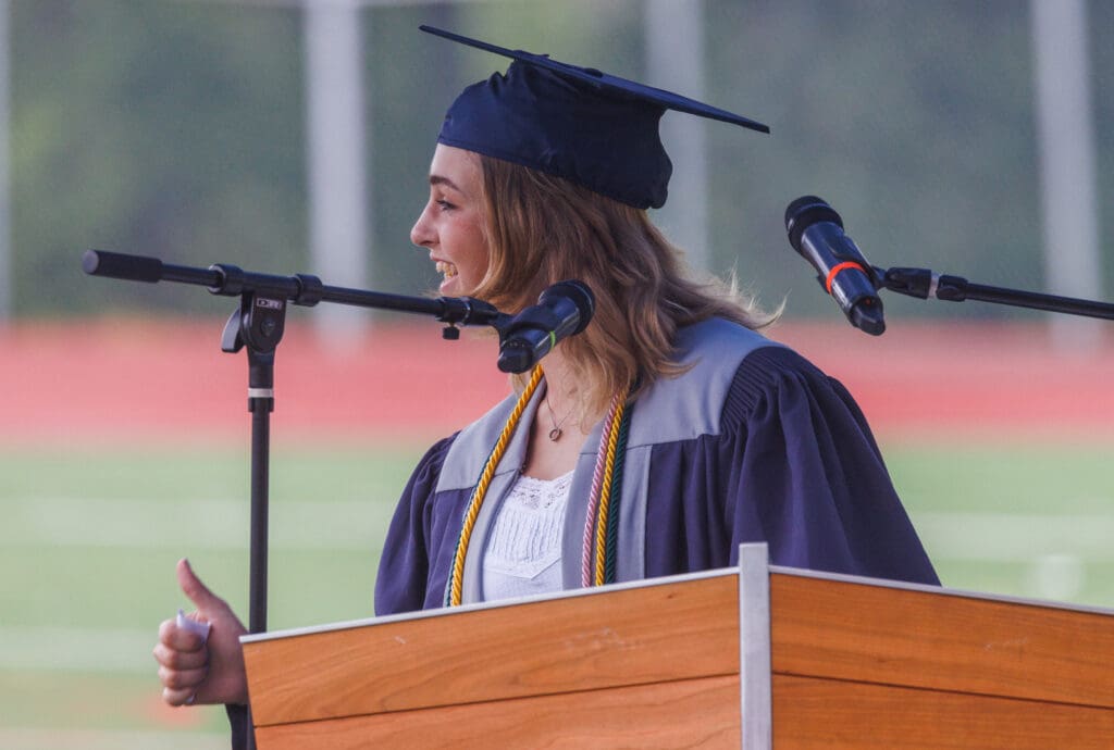 Regan Andersen gives a thumbs up to teachers and students.