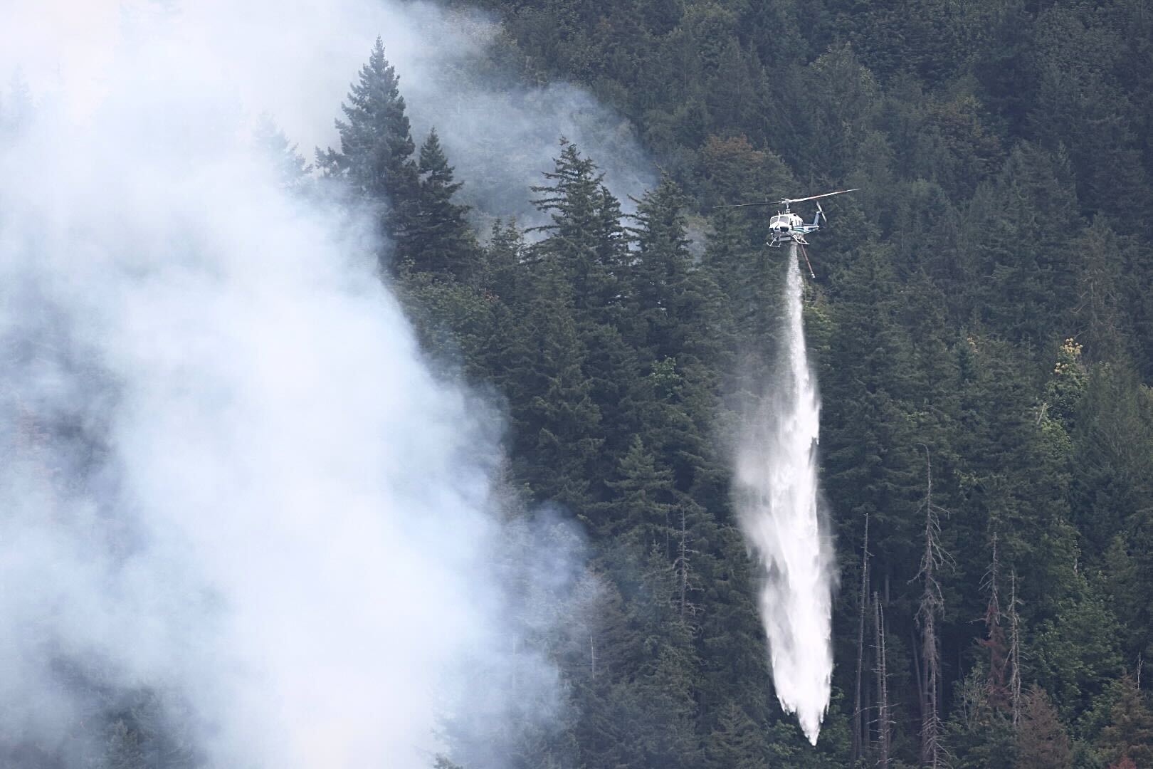 Lake Whatcom Fire 50% contained; helicopter will drop water on north flank