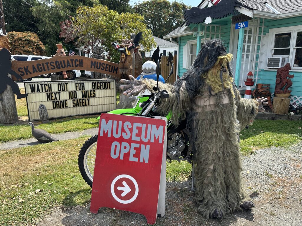 Bigfoot statues around the museum carved by Michael Vail.