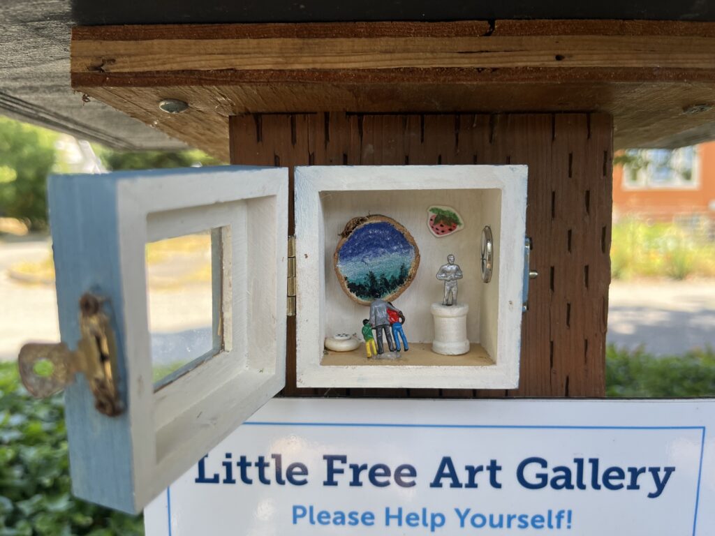 An even tinier version of the Little Free Art Gallery beneath the larger box.