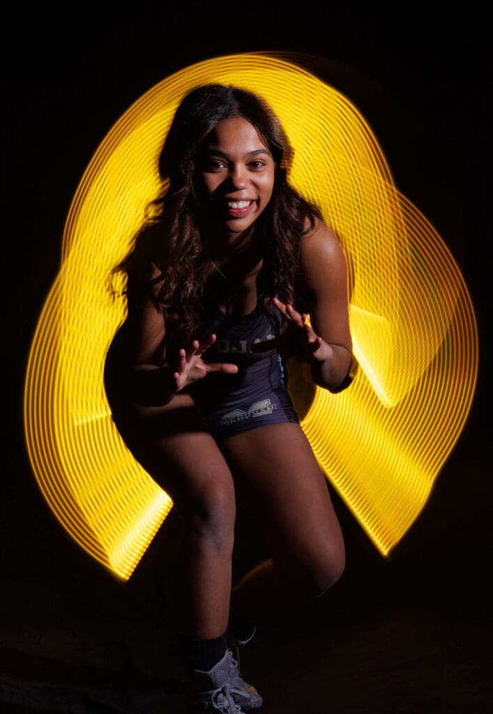 Meridian wrestler Mirage Deneal takes a wrestling stance.