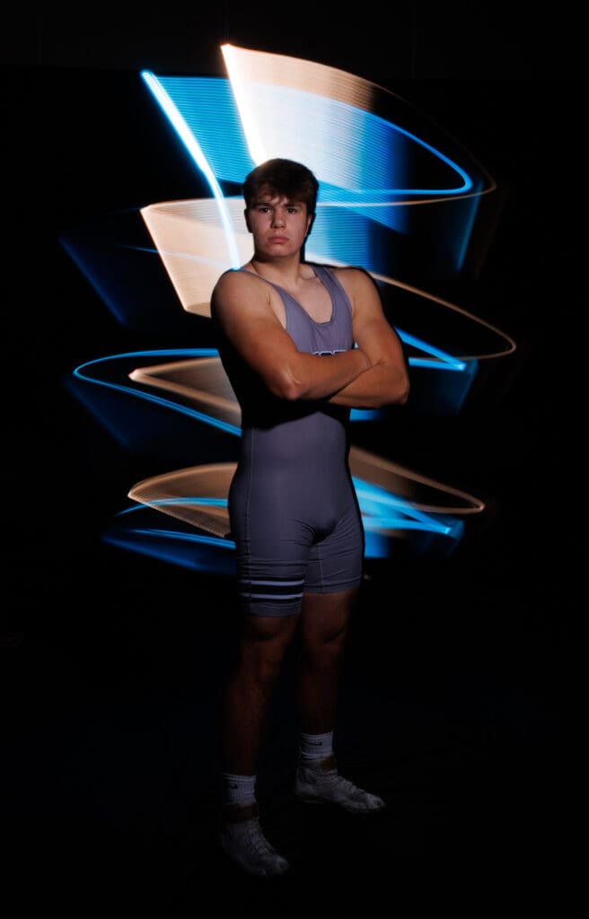 Squalicum wrestler Jason Retz with his arms crossed.