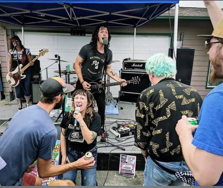 Bellingham-based band LipStitch performs as a singer gets close to the crowd.