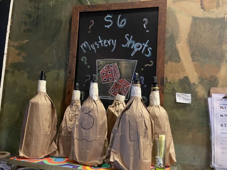 Among the pickled eggs, shelves of alcohol and paintings of cowboys, the Ranch Room also offers $6 mystery shots covered in paper bags to keep it a mystery.