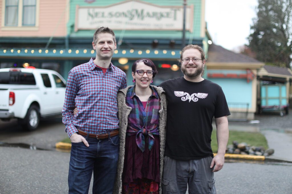 Nelson's Market co-owners Ben and Urania Shaklee, left, and Mars Lindgen, business partner and kitchen manager, right, work together in shaping the memorable market experience on Wednesday, Jan. 24 on Potter Street in Bellingham.