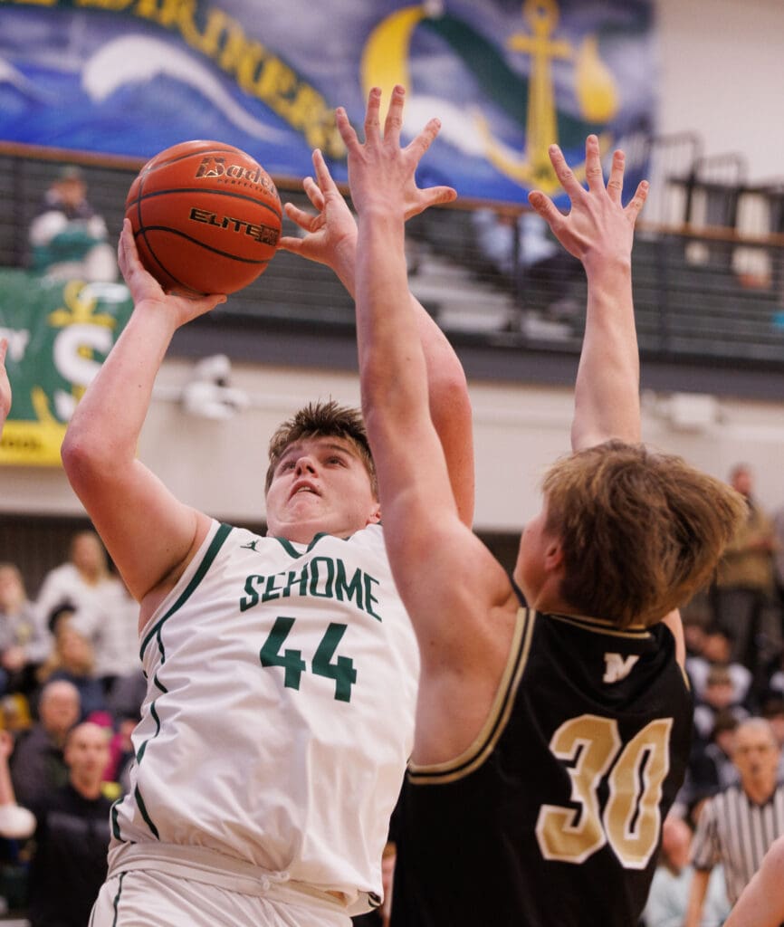 Sehome’s Cole Turrell falls back for a shot.