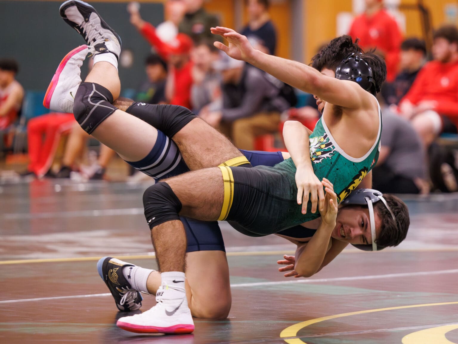 Squalicum’s Brenden Farrell-Garcia throws down Lynden's Christian Velasquez.