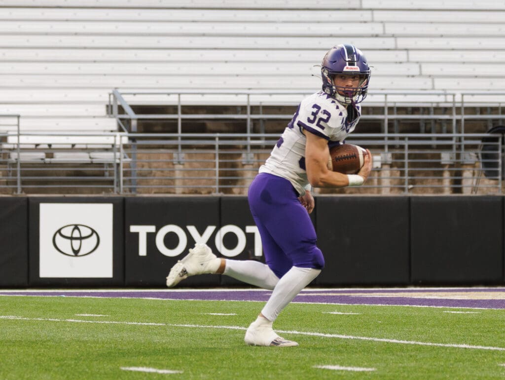 Anacortes' Brock Beaner runs a blocked punt in for the touchdown.