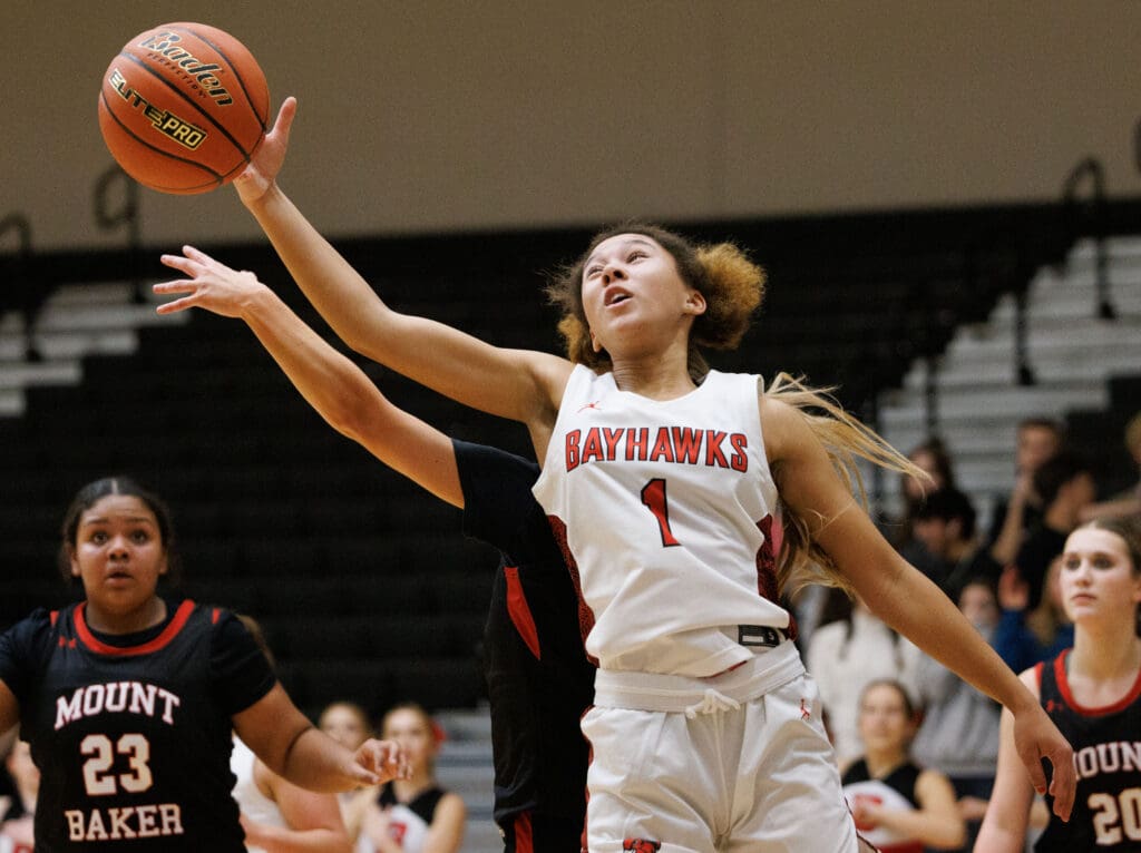 Bellingham’s Lilyauna Jude reaches out for a rebound.