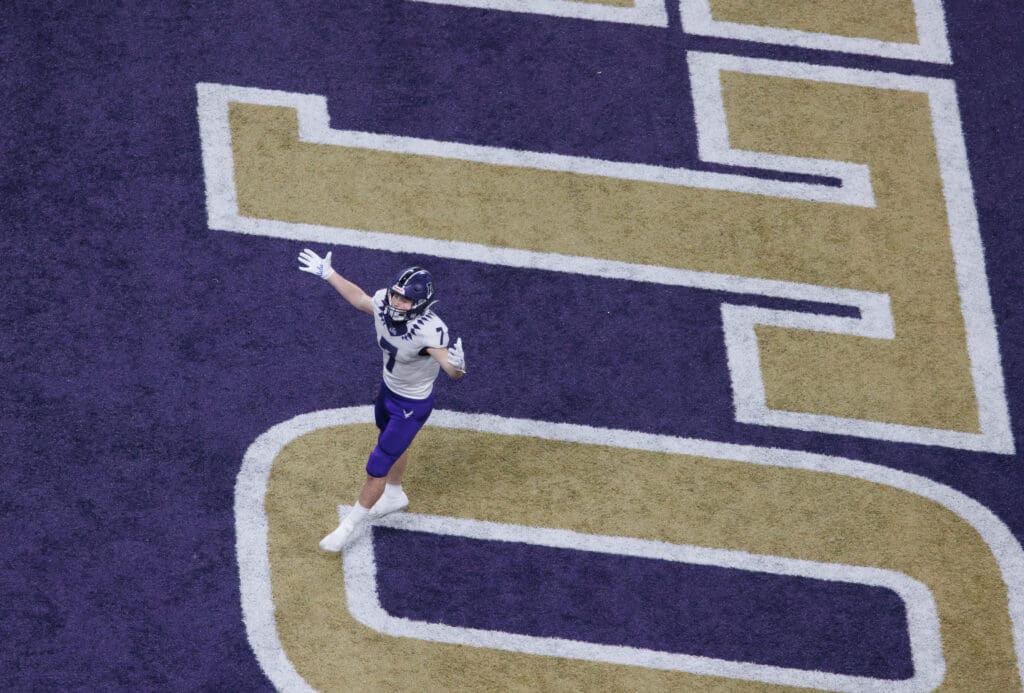 Anacortes wideout Rylin Lang celebrates a touchdown in the end zone.