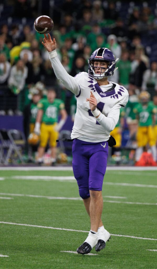 Anacortes quarterback Rex Larson throws a 7-yard touchdown pass to Brady Beaner.