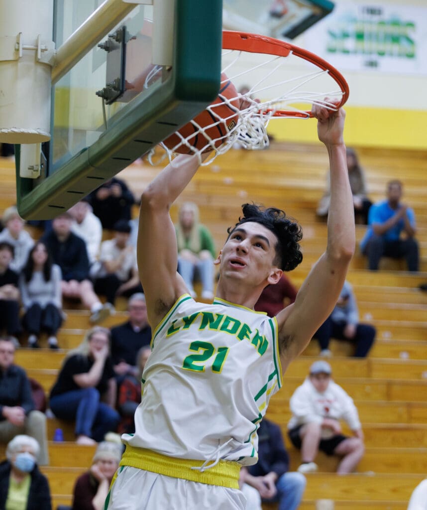 Lynden’s Anthony Canales dunks the ball in the first quarter.