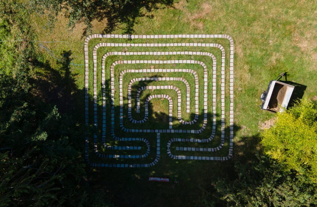 A top down view of the labyrinth laid out on the grass.