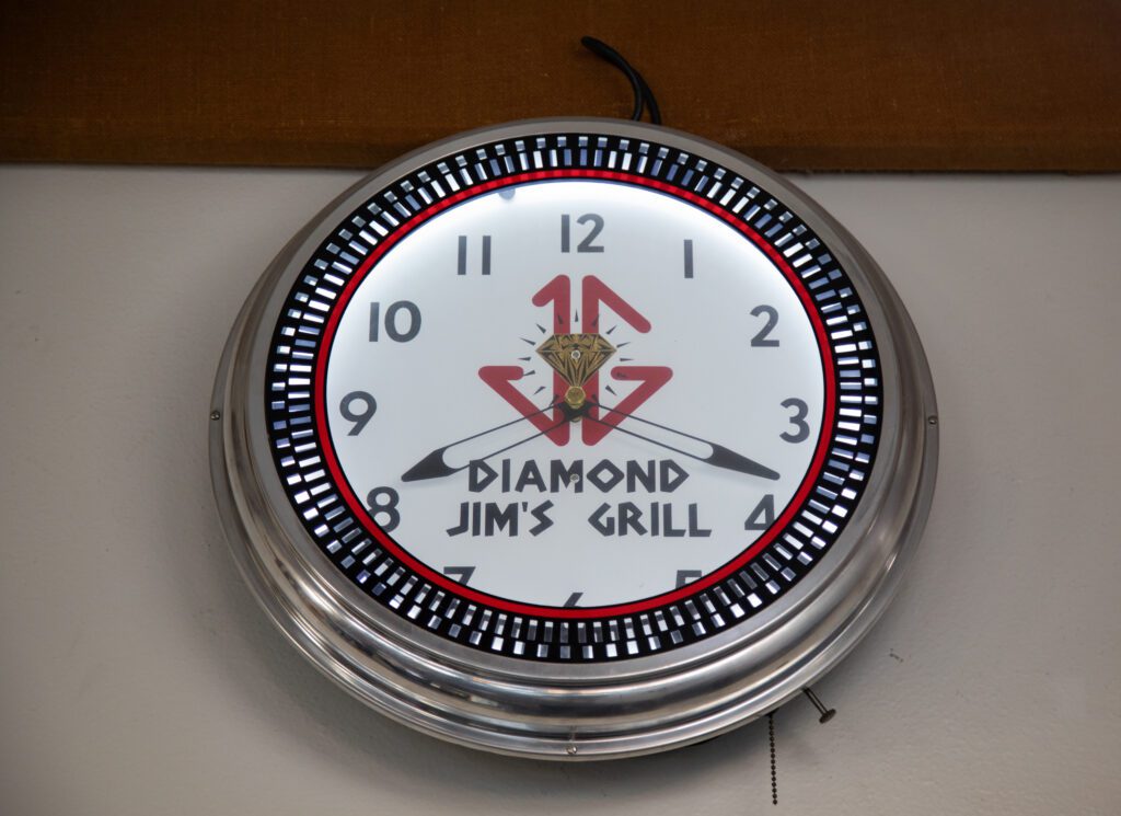 The Diamond Jim themed clock shows 3:40 with its hands.