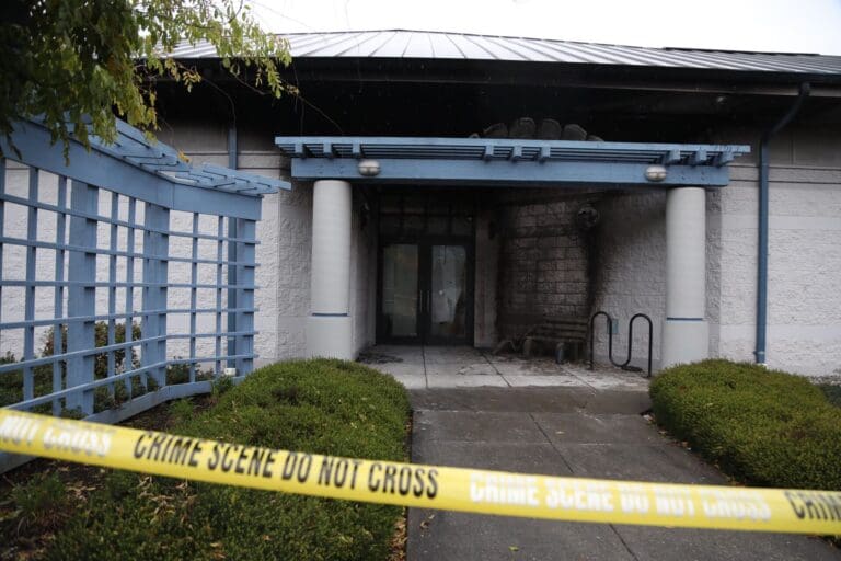 A bench outside Planned Parenthood's Bellingham Health Center has police tape blocking the entrance.