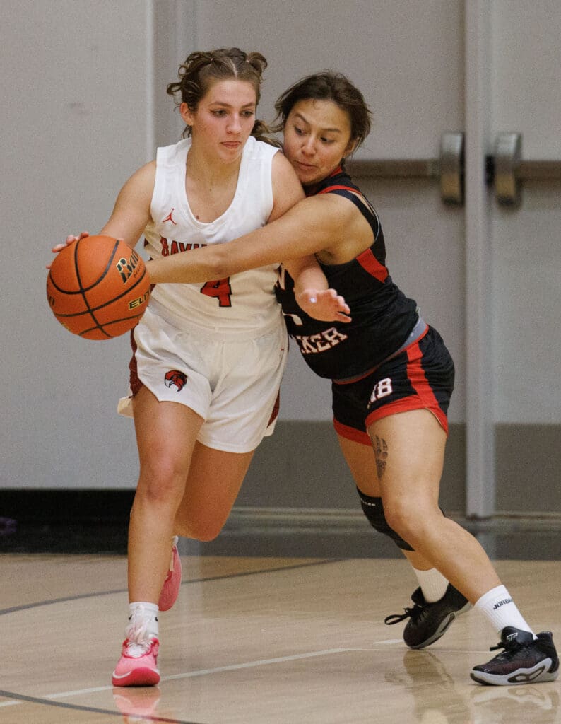 Mount Baker’s Rhona Madera reaches for the ball as Bellingham’s Avery Manning tries to get past in Wednesday’s game.