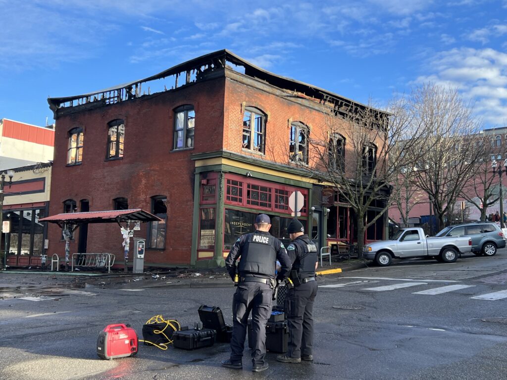 Bellingham police assess damages on the road right in front of the Terminal Building.