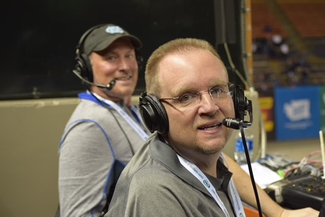 Dan Kaemingk, left, and Mark Scholten look over to the camera with their headsets on.