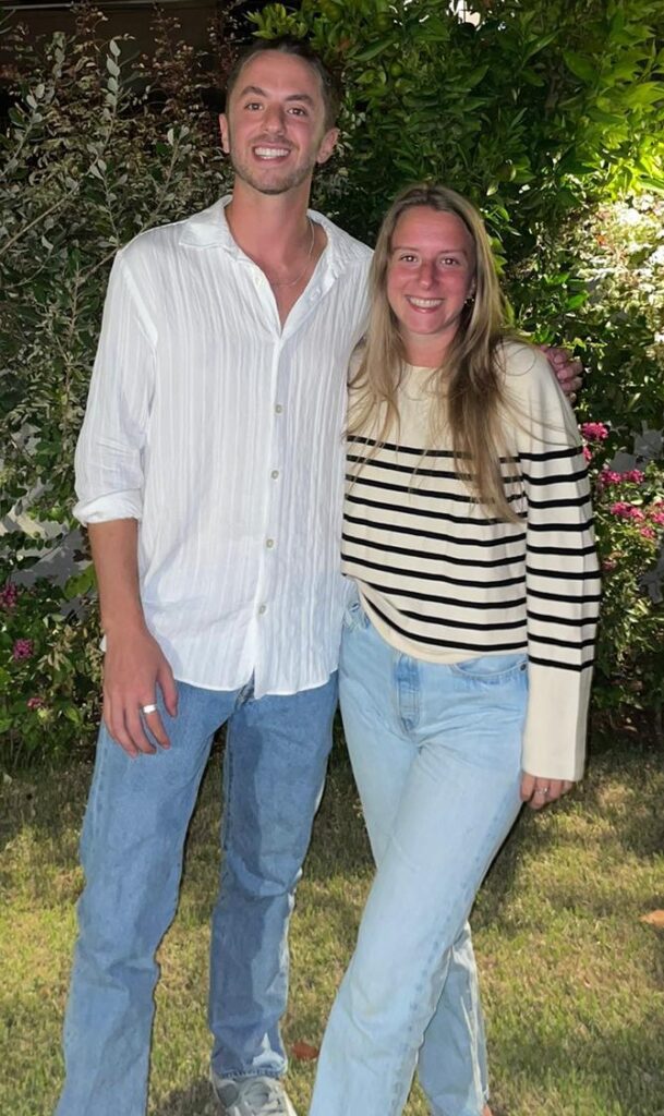 Isaac, left, and Shoshana Schapiro pose for a photo side by side.