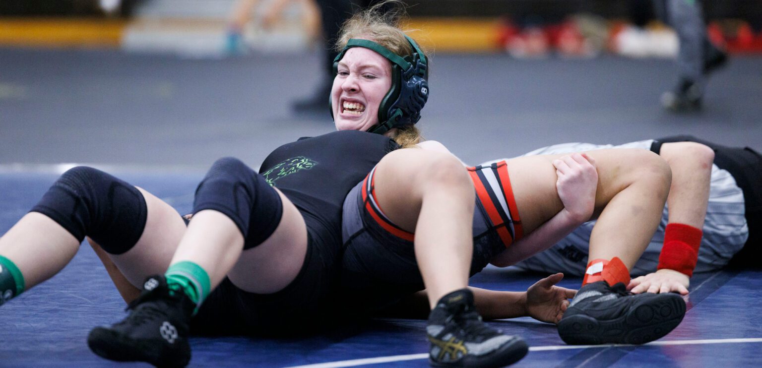 Lynden's Lily Miller goes for the pin.