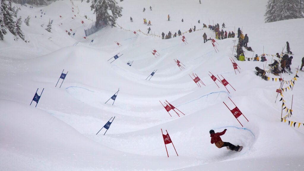 Kari Hoss of Glacier carves through the Legendary Banked Slalom on Feb. 2, 2023. The 2024 race has been canceled due to poor conditions.