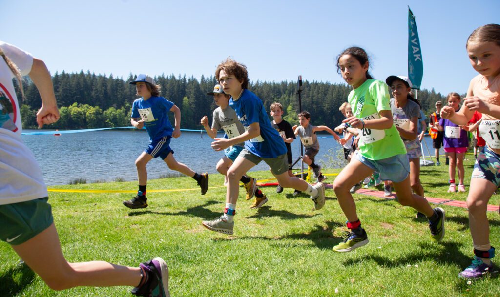 The elementary school racers launch from the starting line to run approximately 2 miles at Lake Padden on Saturday, May 11 during the Junior Ski to Sea Race. Around 50 teams participated this year.