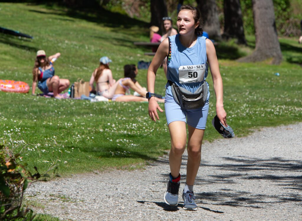 Sivan Wells-Langley of The Airow Project - Girl Power approaches the finish line after completing 2.6 miles in the middle school and high school race.