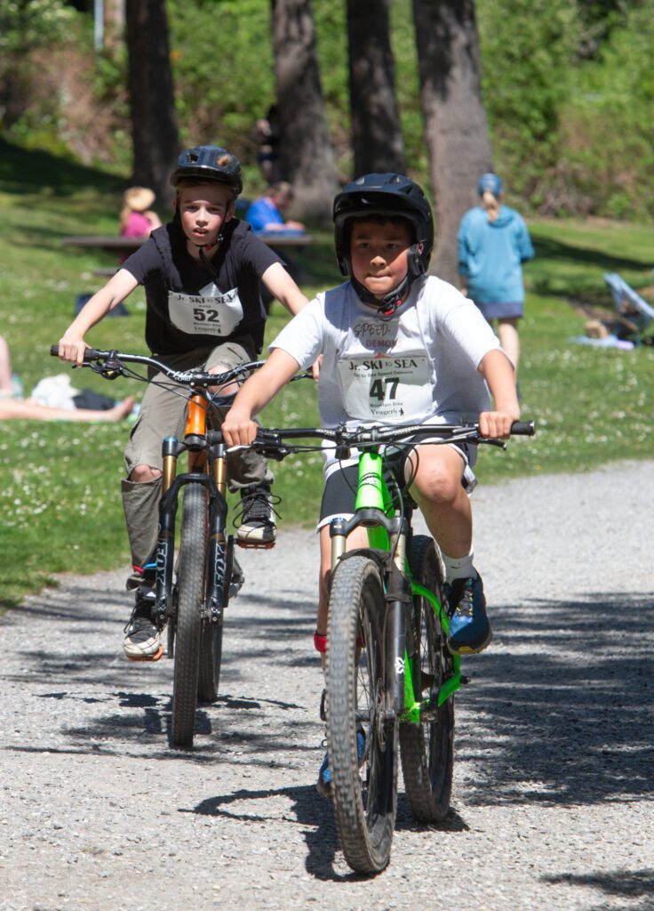 Brady Swanson, right, of the Ski to Sea Speed Demons slightly leads Seth Webb of WASA.