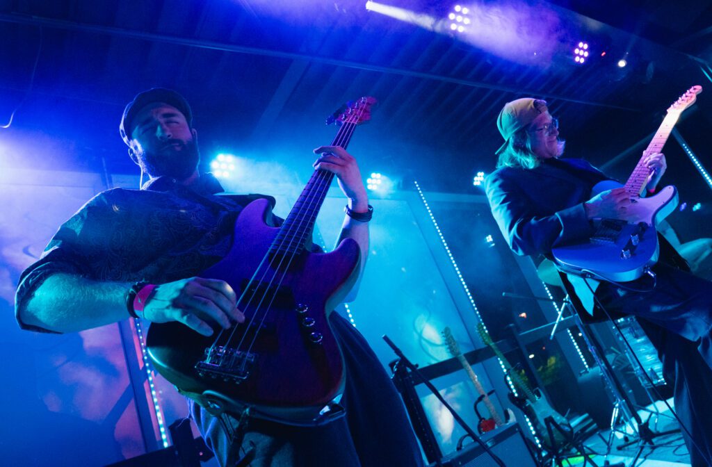 Pure Halcyon's bassist and one of their new guitarists jam out. The band headlined Friday's show at the Blue Room.