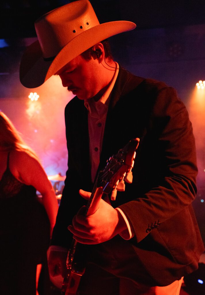 Pure Halcyon's Sam Kristofferson shredded on guitar, frequently making his way up the crowd or to the back of the stage to jam with the drummer.