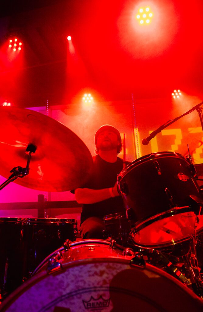 Sour Fuzz drumer Justin Dobbelaar pauses for a moment to take in the crowd Sunday at the Blue Room.