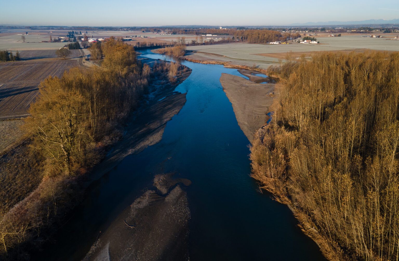 An aerial view of the stream flowing through Whatcom County.