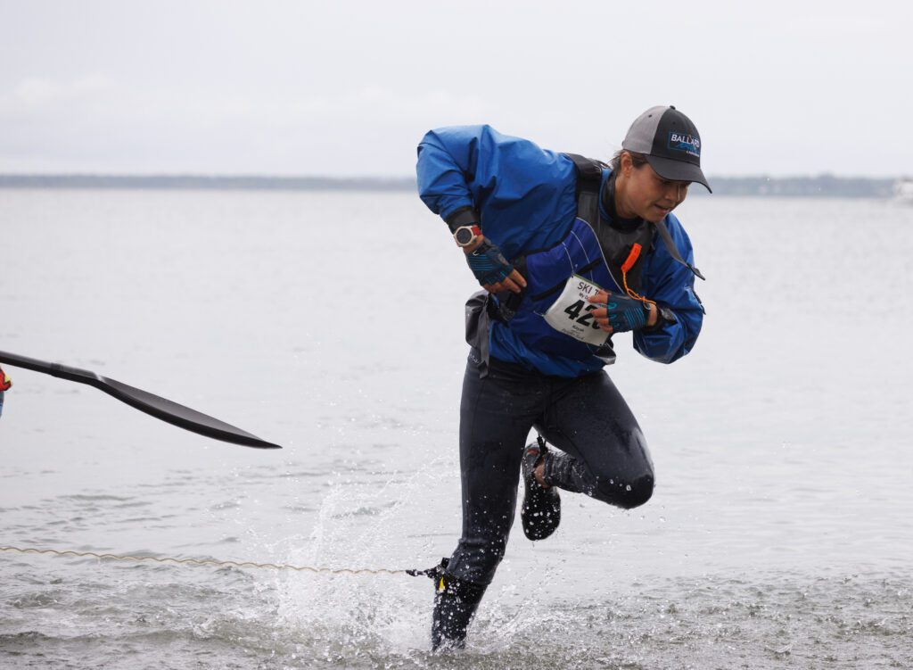 Chloe Olson gets tripped up by her kayak leg leash as she races for the finish line of the 2024 Ski To Sea Race on May 26 in Bellingham.