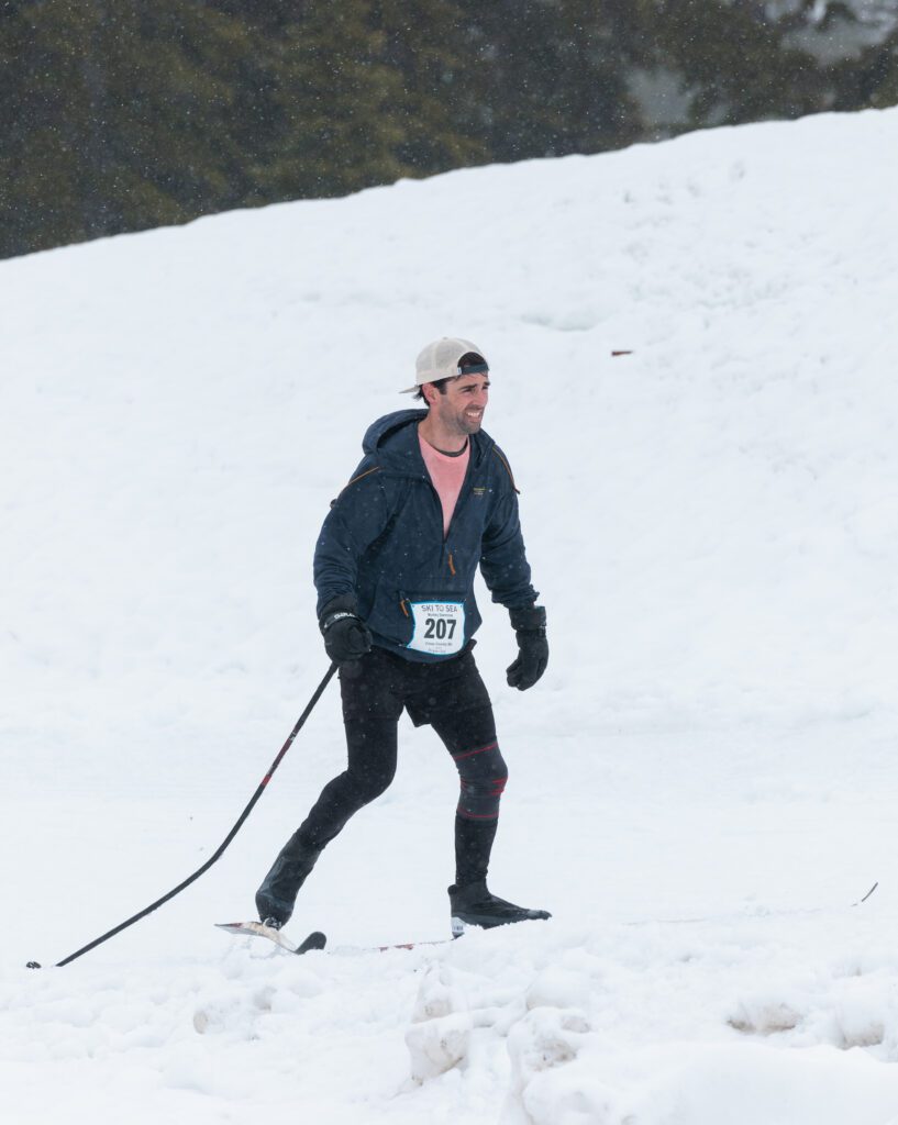 Cross-country skier Steve Dougan of team Murkey Sizemores goes uphill after losing a ski pole.