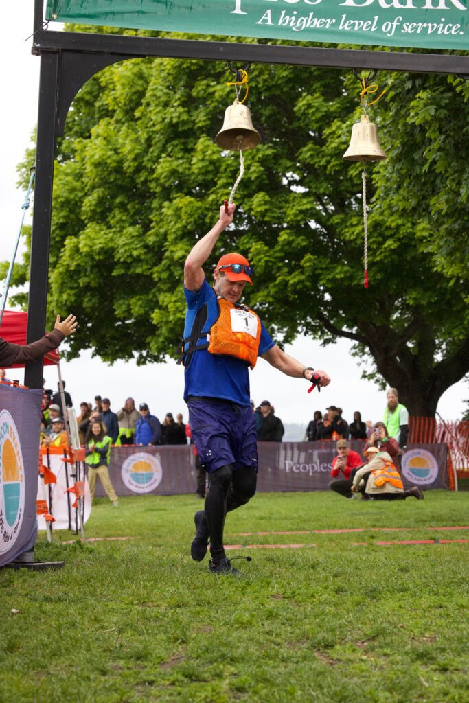 Kayaker Jeff Hilburn of Birch Equipment finishes first in Ski to Sea.